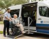 Driver helping a wheelchair user into an accessible van in Houston
